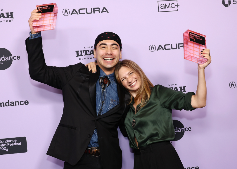 Julian Brave NoiseCat and Emily Kassie pose with award at Sundance.