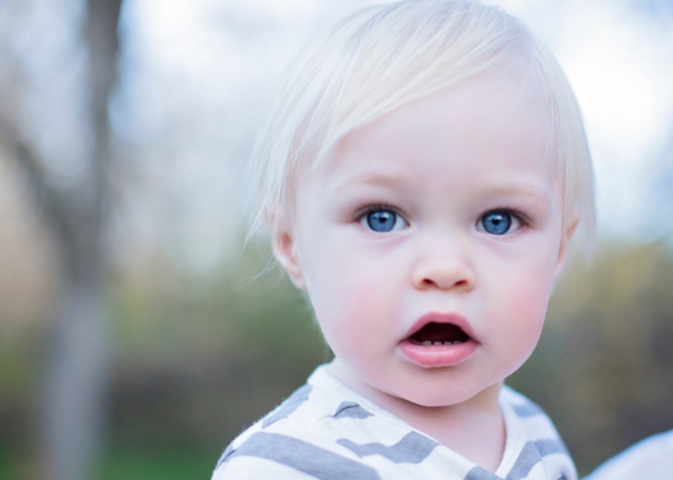A blue-eyed blond baby boy. 