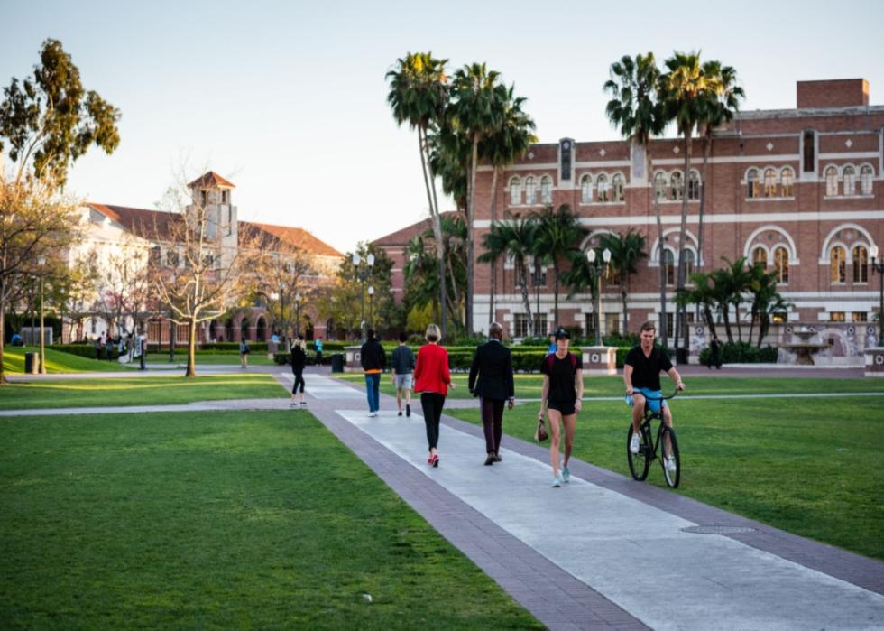 Students walking and cycling at USC.