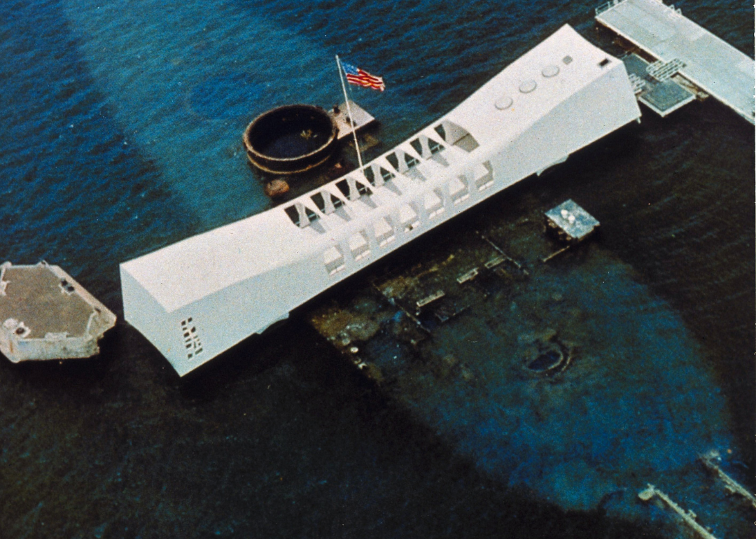 An aerial view of the USS Arizona National Memorial, which spans the sunken hull of the battleship in Pearl Harbor