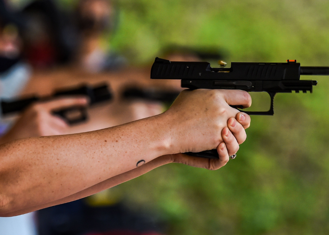 A student firing a handgun during a shooting course at Boondocks Firearms Academy in Jackson.