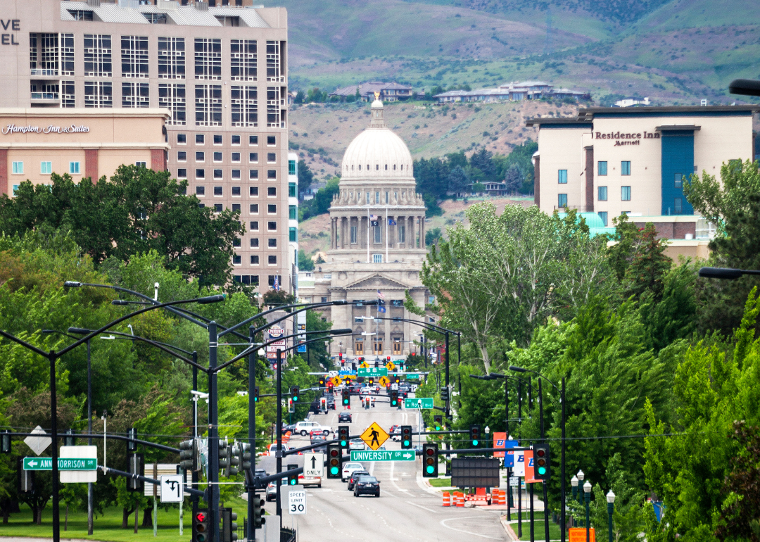 A street-level view of downtown Boise focused on the capital building.
