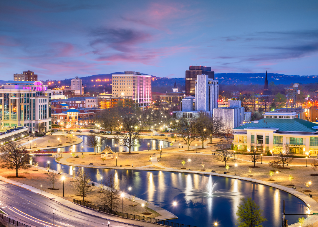 Huntsville's skyline as viewed at dusk.