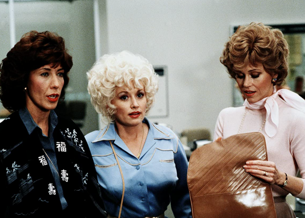 Lily Tomlin, Dolly Parton, and Jane Fonda in a scene in the film 9 to 5.