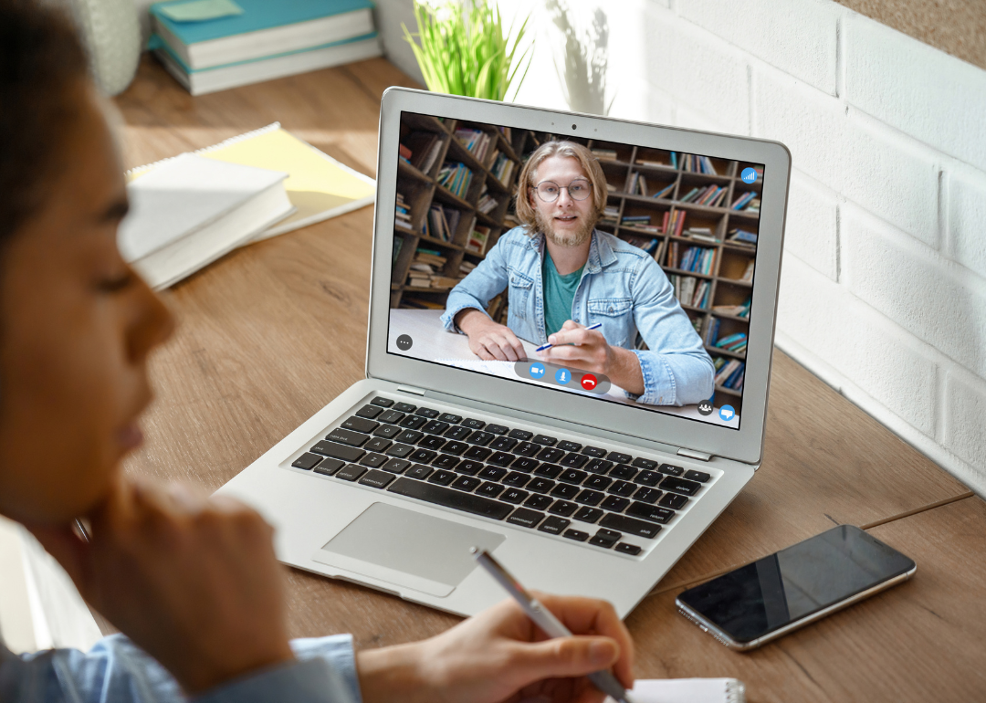 A college student taking an online class.