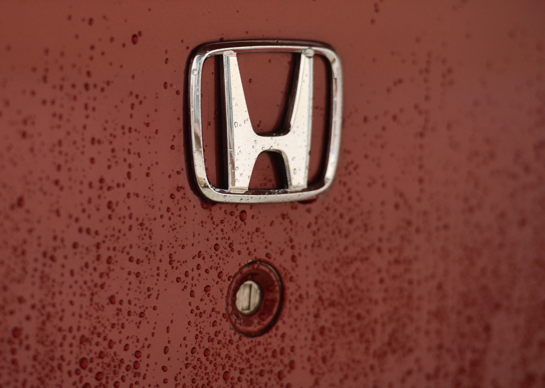 Honda's logo as seen on a parked car in Krakow.