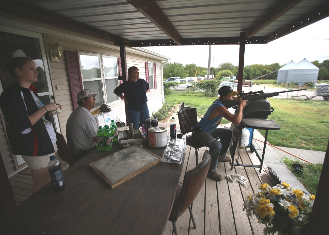 A person shooting birds while spending an afternoon on the front porch with their family in Logan.