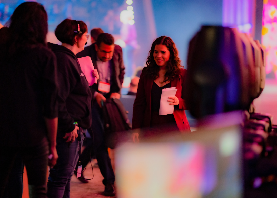 Actress America Ferrera walking backstage following her talk at TED 2019.
