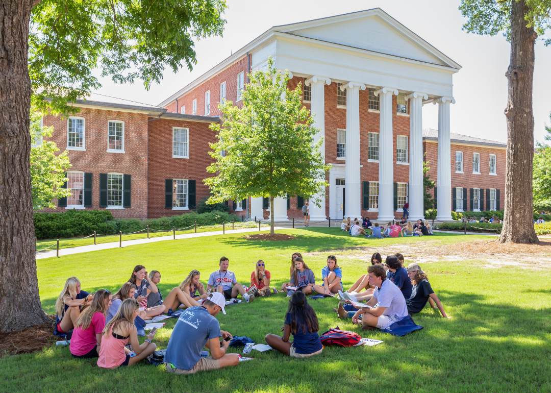 Students sitting in a circle on the campus of the University of Mississippi.