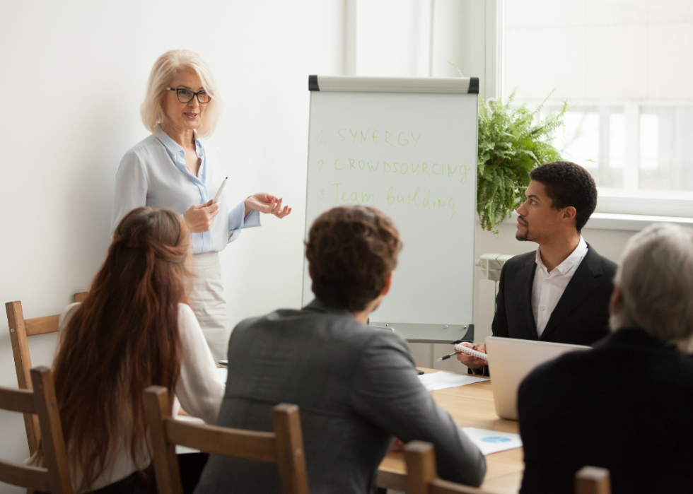 A woman holding a meeting.