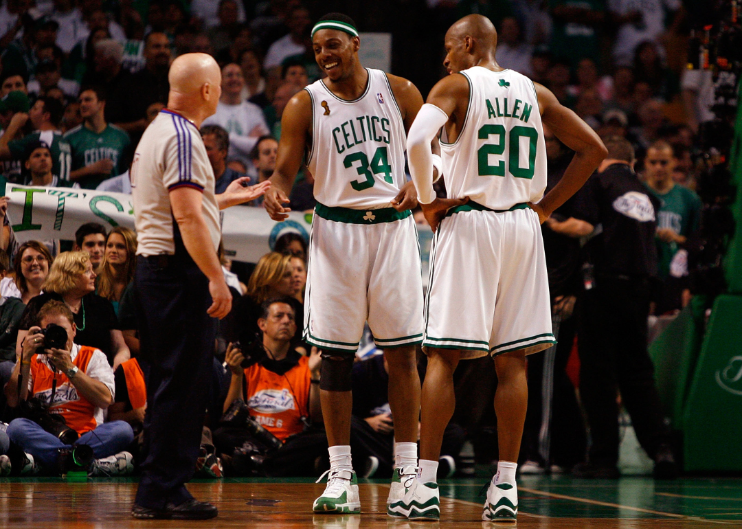 Paul Pierce #34 and Ray Allen #20 of the Boston Celtics sharing a laugh with referee Joe Crawford in the fourth quarter of Game Six of the 2008 NBA Finals against the Los Angeles Lakers on June 17, 2008, in Boston.