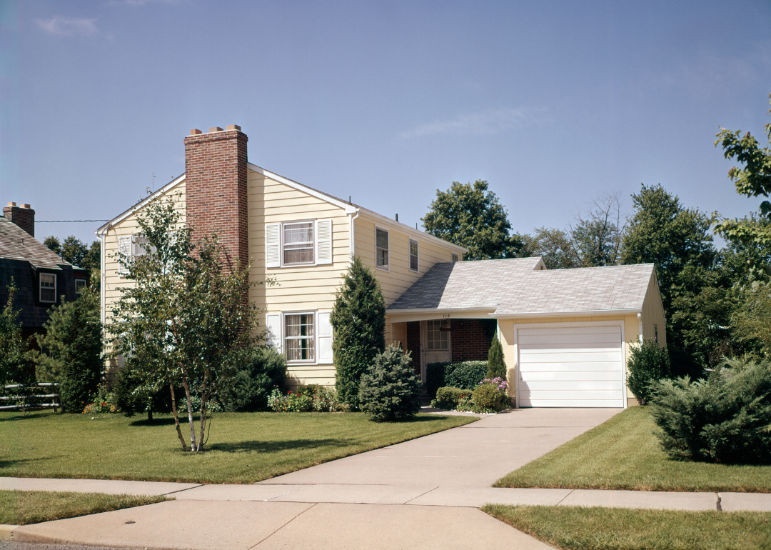 A two-story yellow house in 2007.