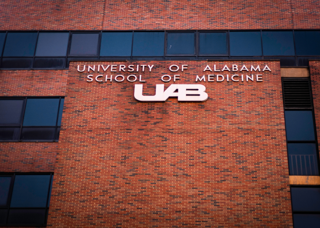 The University of Alabama at Birmingham UAB Hospital title and logo on a brick facade