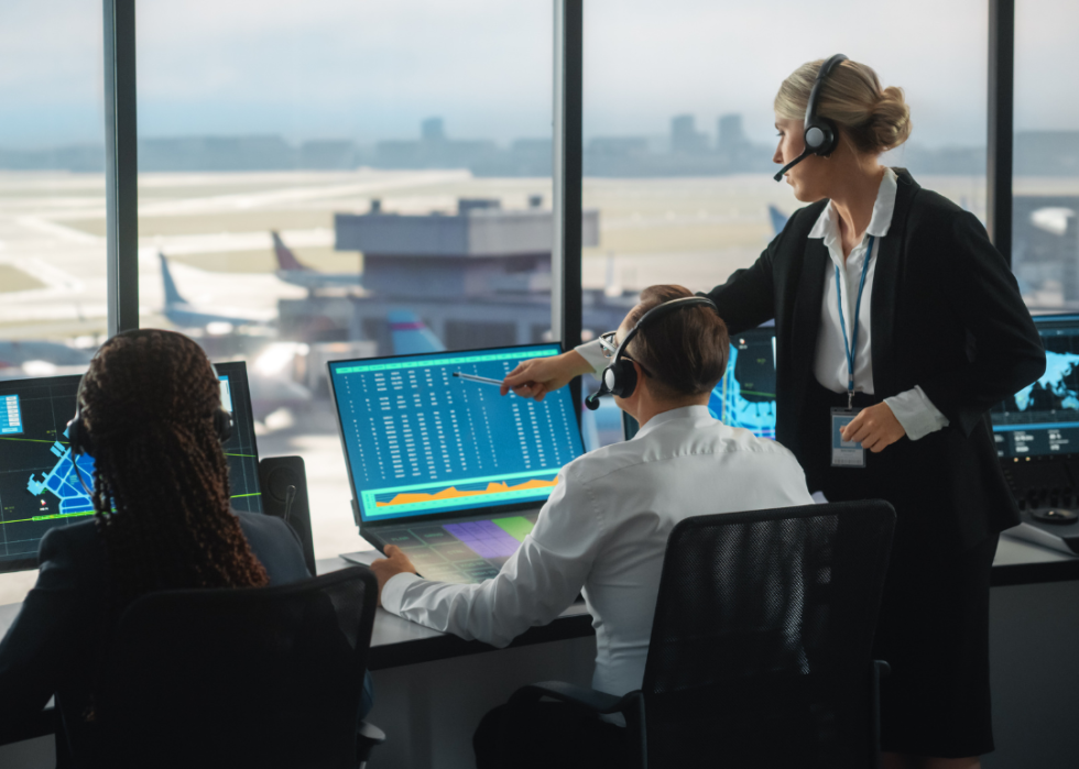 An air traffic controller managing flight arrivals and departures