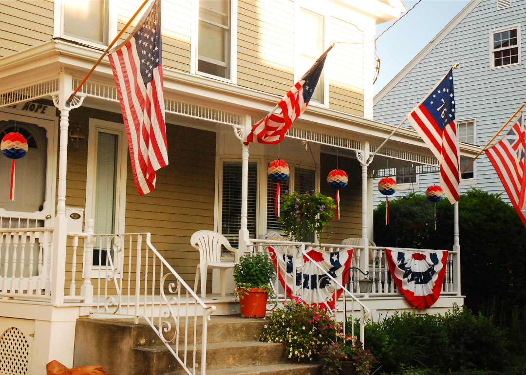 A house in Bristol, Rhode Island flying the stars and stripes on Independence Day.