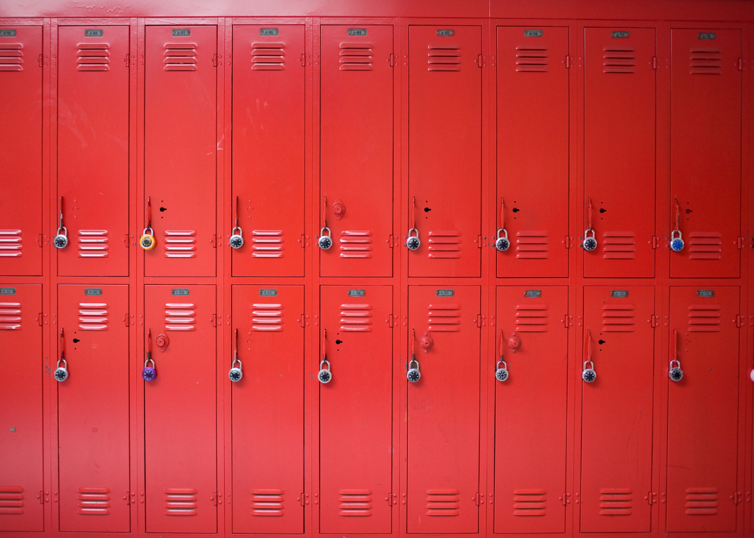 Two rows of red lockers.