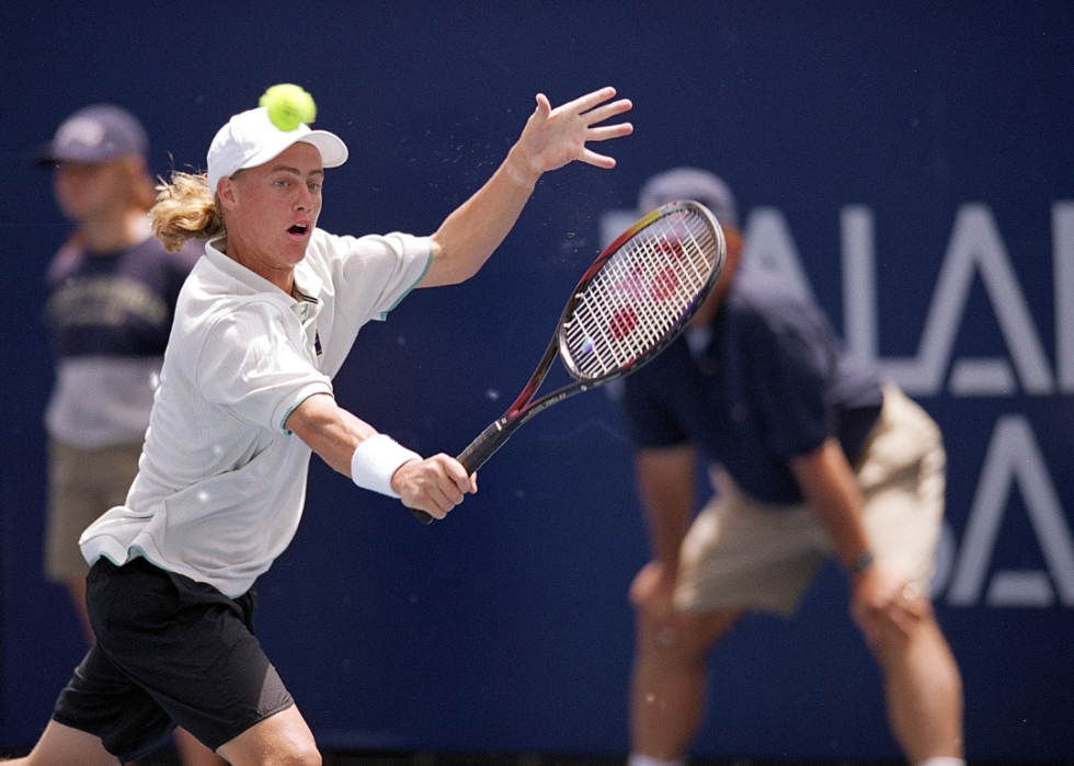Lleyton Hewitt returning the ball during the 1999 Mercedes - Benz Cup match against Alex O''Brien at the UCLA Tennis Court in Westwood, California