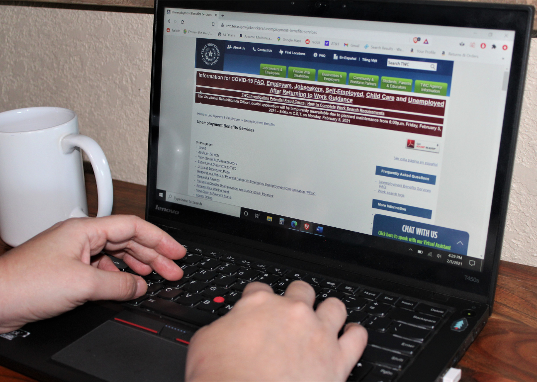 A person applying for unemployment insurance benefits using the Texas workforce commission website