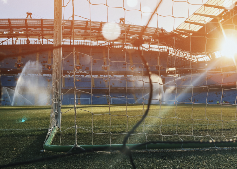 A soccer field at sunset