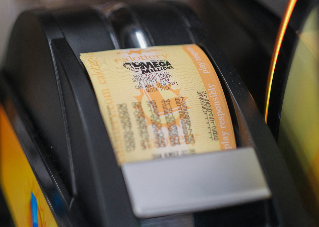 A machine printing a Mega Millions lottery ticket.