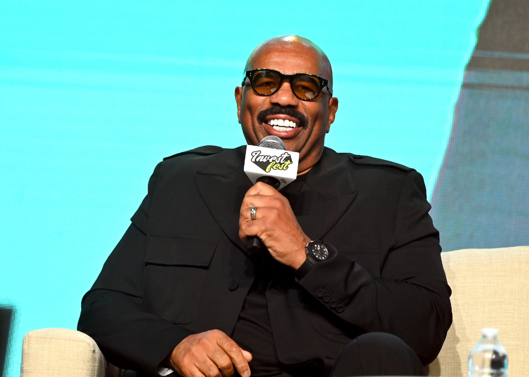 Steve Harvey speaking onstage during 2022 InvestFest at Georgia World Congress Center on August 06, 2022, in Atlanta, Georgia.