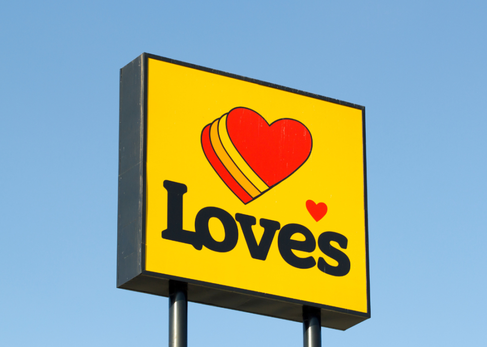 The Love's sign at a travel stop with a gas station.