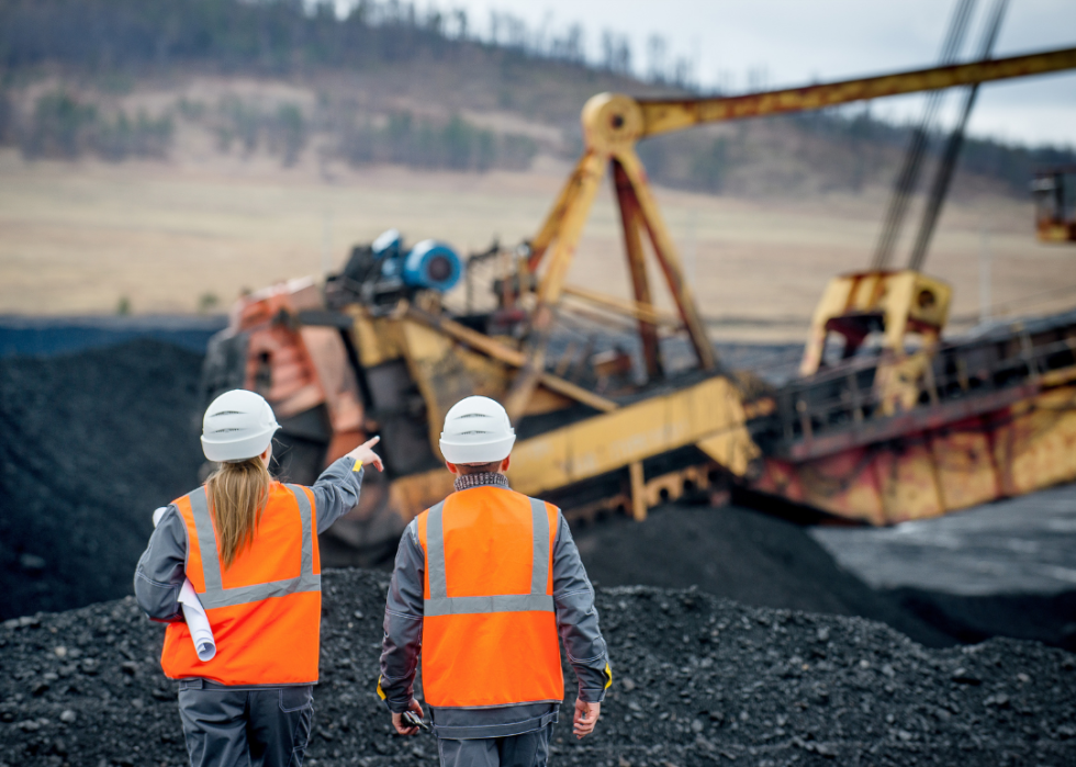 Mining managers overseeing operations