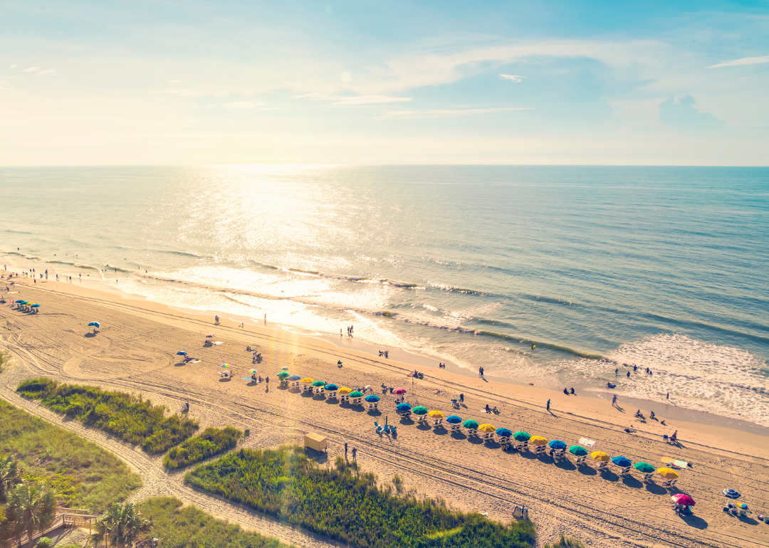An aerial view of colorful umbrellas and people on Myrtle Beach.