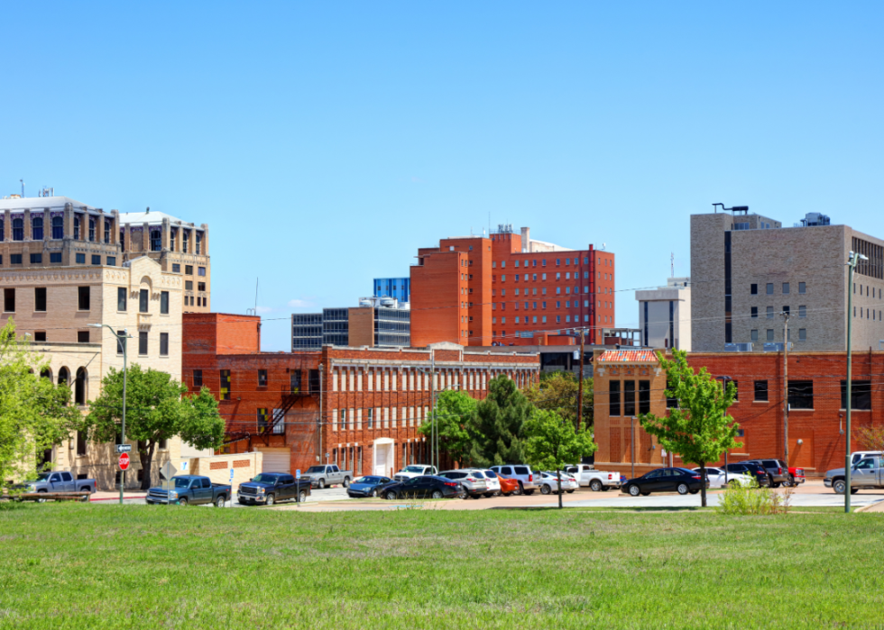 A view of a city with red brick buildings. 