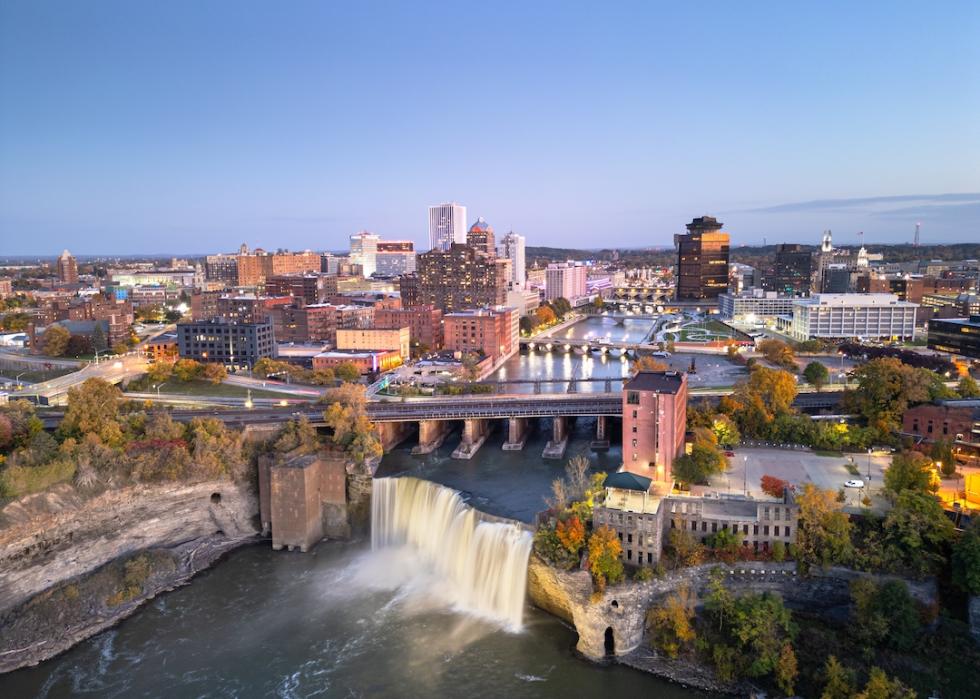 Cityscape on the Genesee River and High Falls at twilight in Rochester, New York.