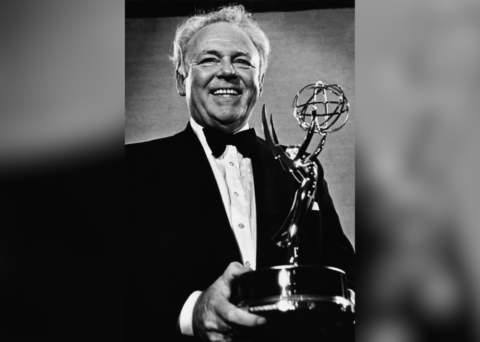 Carroll O'Connor poses with the Emmy Award in 1979.