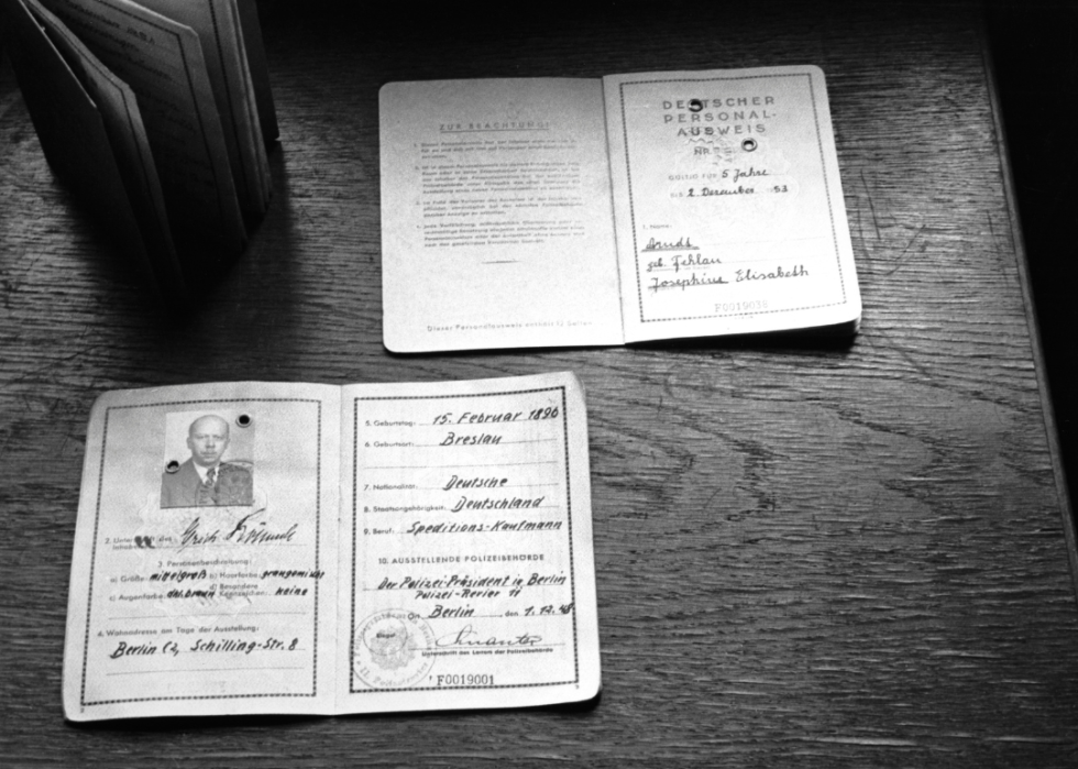 Three identity cards displayed in Berlin in 1948.