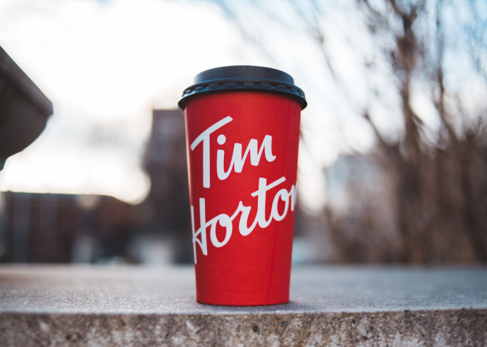 A Tim Horton's to-go coffee cup.