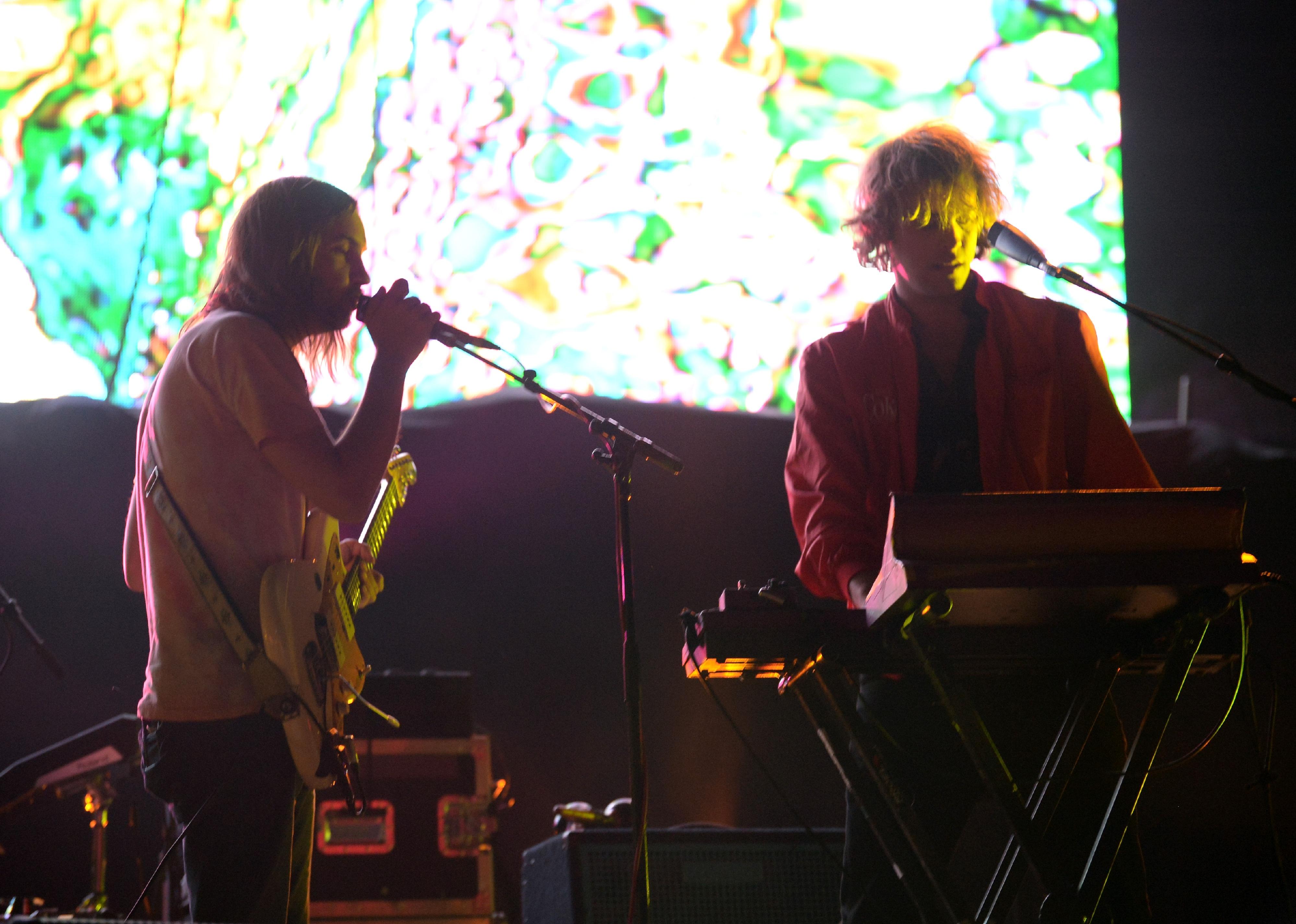 Tame Impala sing a song onstage