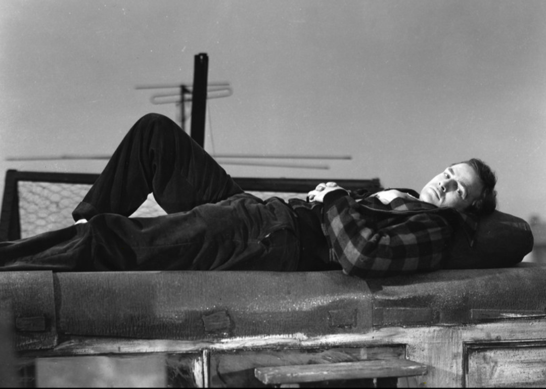 Marlon Brando lying down.