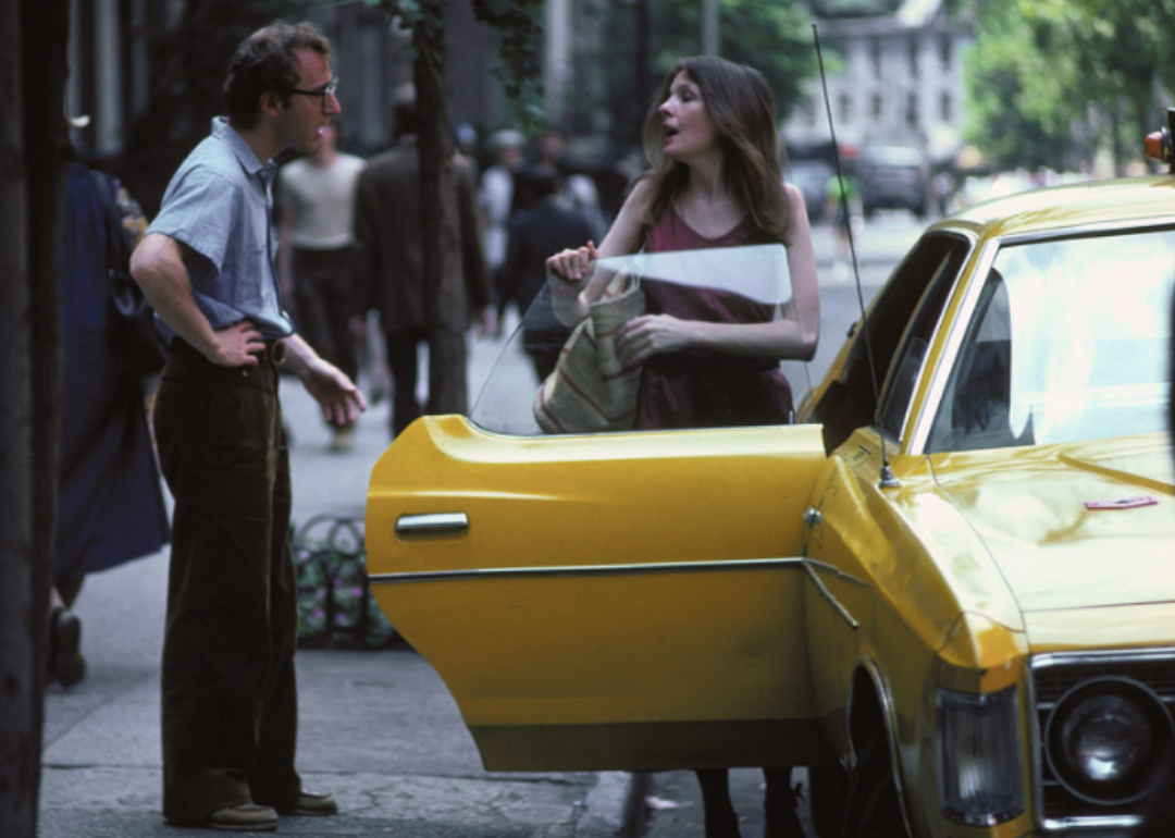 Diane Keaton and Woody Allen talking as she gets into a cab.