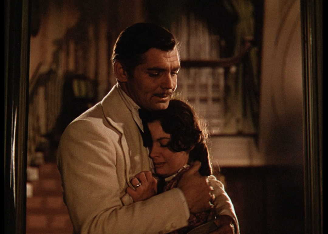 Clark Gable and Vivien Leigh hugging.