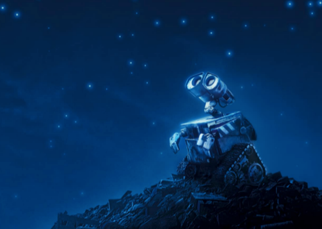 A cartoon robot looking up at the stars.