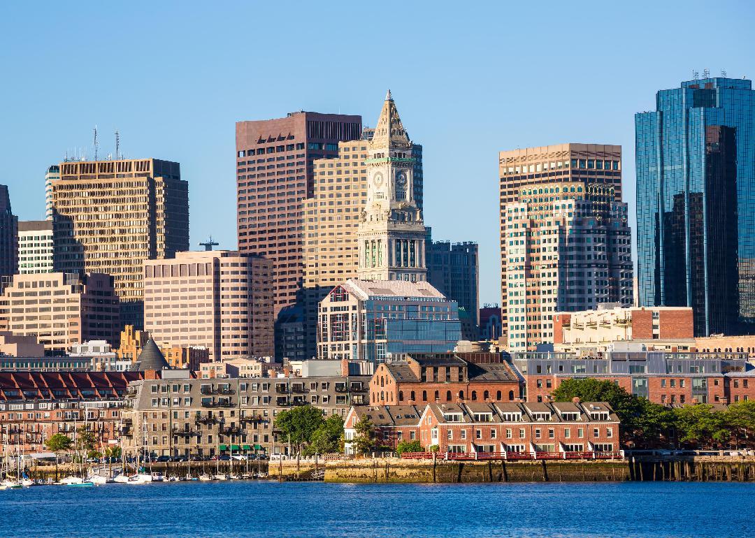 Boston skyline with river in sunlight at Massachusetts.
