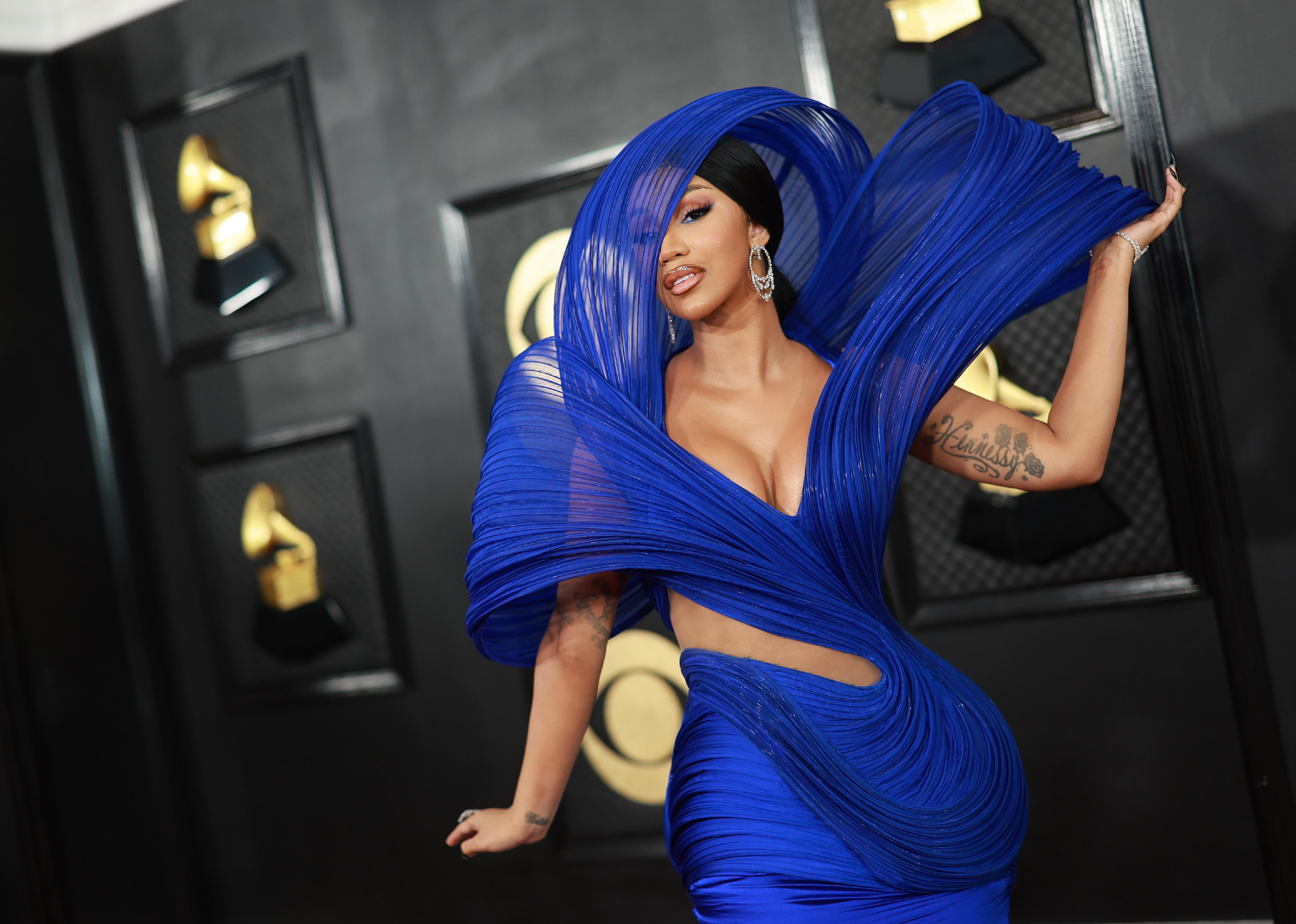 Cardi B in a blue avant garde gown.