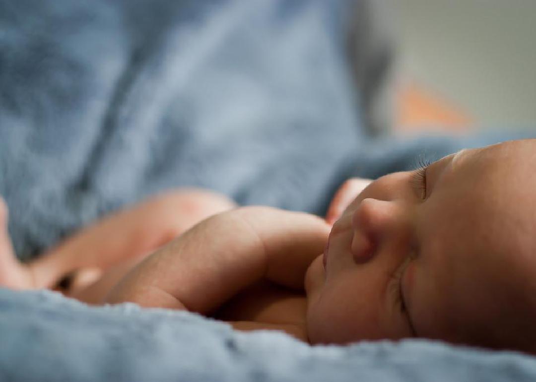A close up of a newborn baby. 