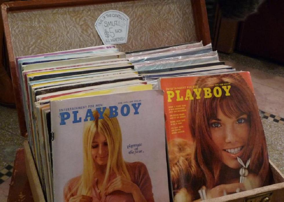 Rack of Playboy magazines.