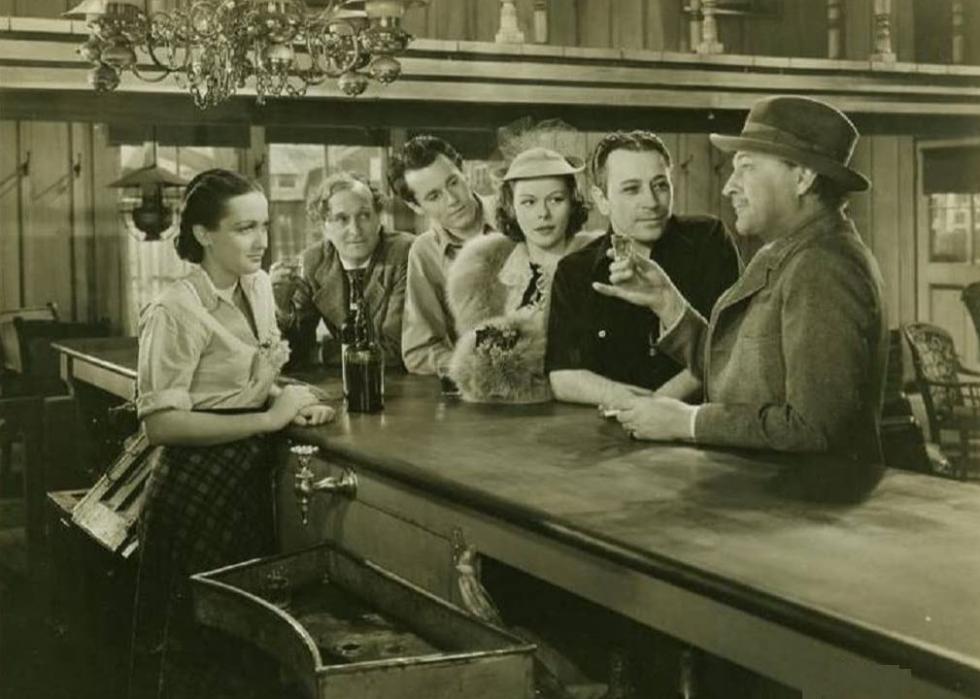Henry Fonda, John Barrymore, Dorothy Lamour, Lynne Overman, Louise Platt, and George Raft in a scene from "Spawn of the North"