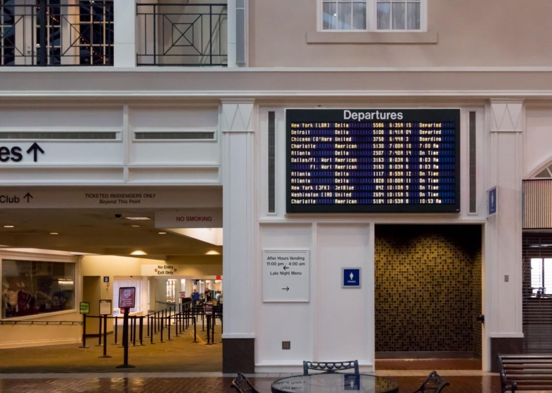 A departures sign inside Hilton Head airport.