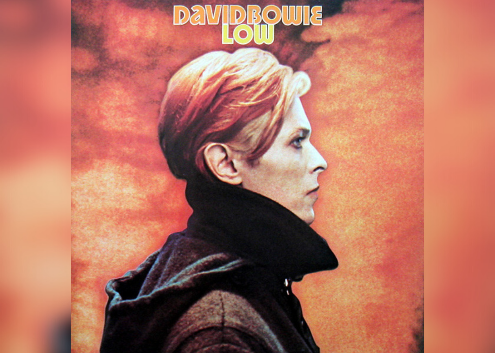 David Bowie side profile with orange background.