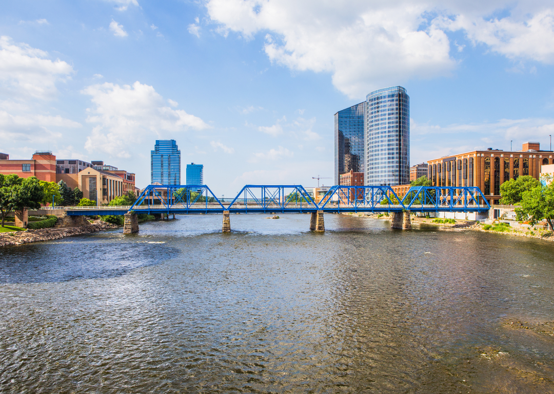 A blue bridge across the Grand River in Grand Rapids, MI.