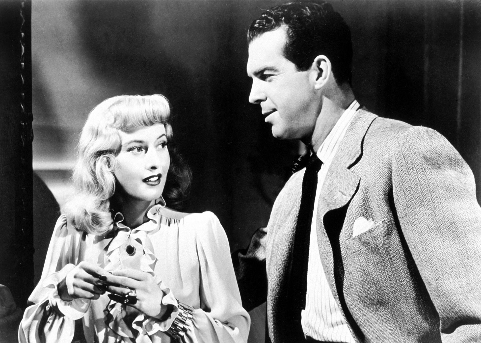 Actors Barbara Stanwyck and Fred MacMurray in a scene from ‘Double Indemnity.'