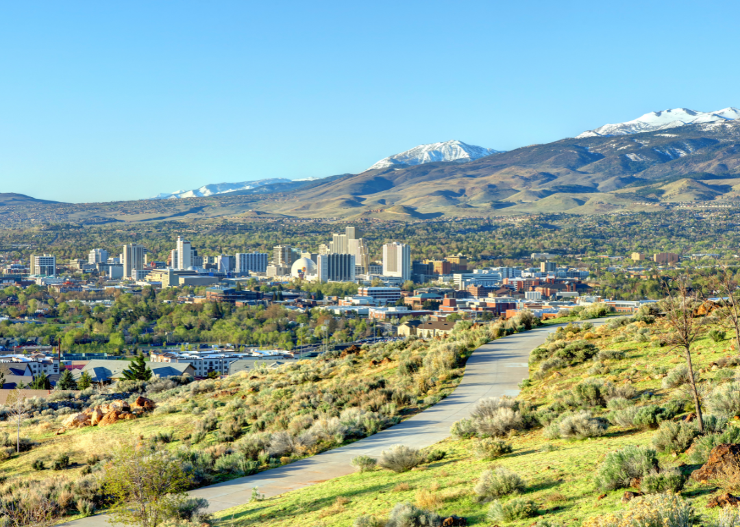 Aerial view of Reno, NV with mountains in the background.