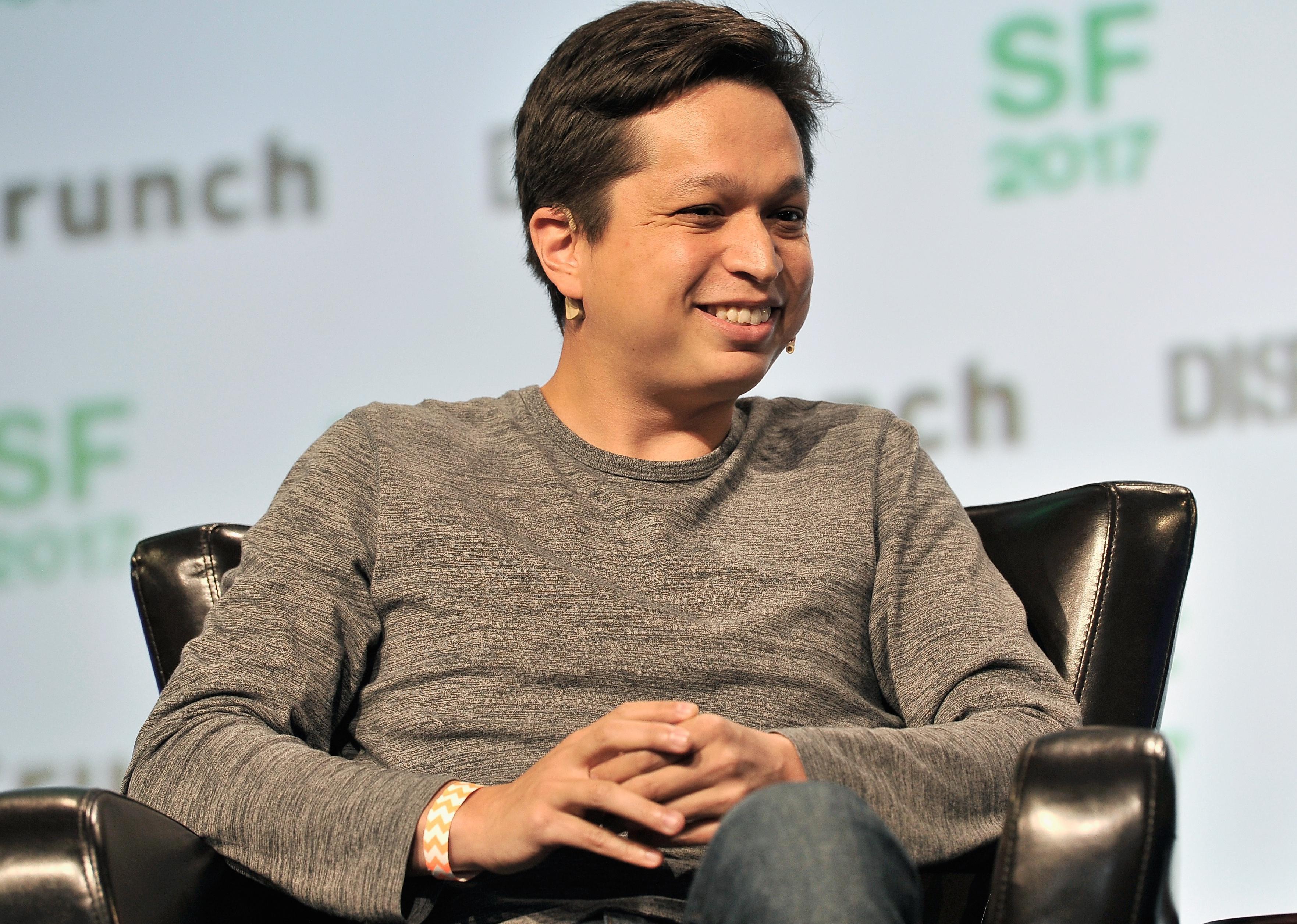 Ben Silbermann in a black leather chair on stage.