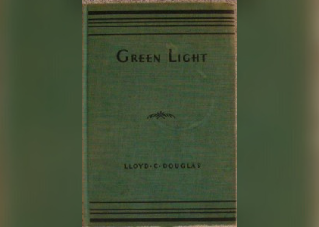 A green cover with black writing.